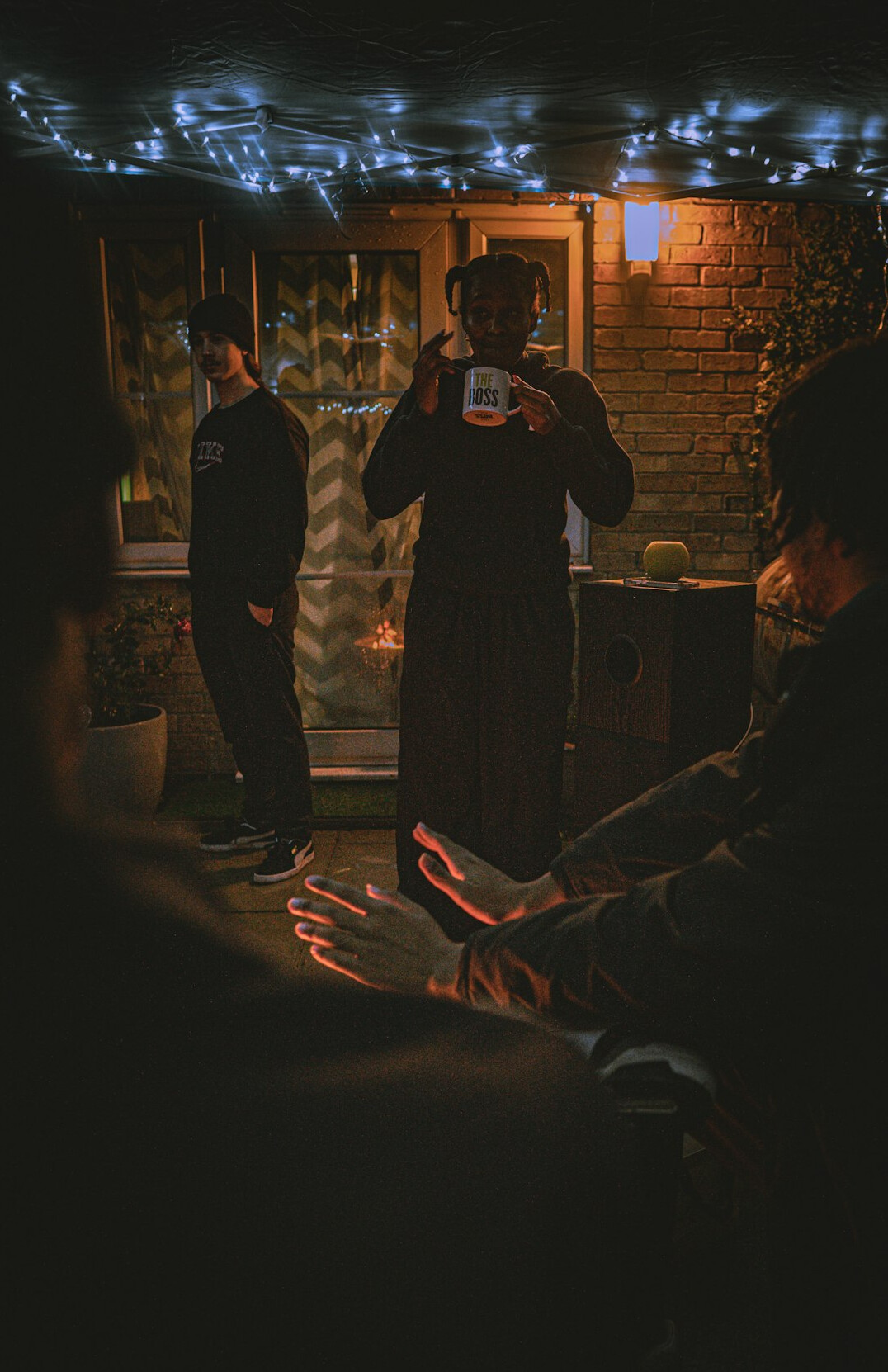 Team of mediation specialists reviewing broadcast footage around a table